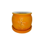 Small orange flower pot with saucer